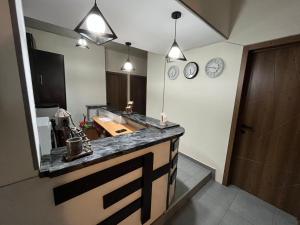 Kuchyň nebo kuchyňský kout v ubytování Hotel G&G