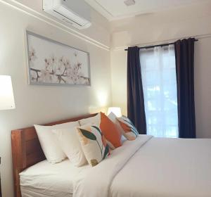 Postel nebo postele na pokoji v ubytování Kudugman Beach Cottages - El Nido + 37 fotografií