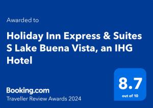 a blue sign that reads holiday inn express and suites lake buena vista at Holiday Inn Express & Suites S Lake Buena Vista by IHG in Kissimmee