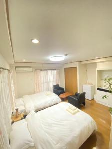 Ένα ή περισσότερα κρεβάτια σε δωμάτιο στο Minato Shibaura-203