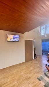 TV a/nebo společenská místnost v ubytování Casa María