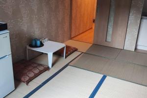 全新上线花跡民宿4号館203，关西机场直达萩之茶屋出站1分钟！难波，心斋桥4分钟车程！的厨房或小厨房