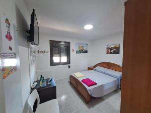 Cama ou camas em um quarto em Dali y surrealismo en Vilanova i la Geltrú