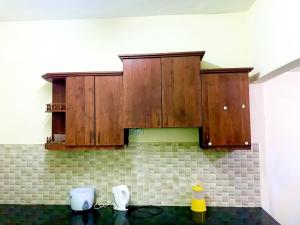 Kuchyň nebo kuchyňský kout v ubytování Isyfaq Homestay 4 Bedroom & 3 Bathroom + 11 fotografií