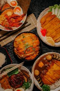 a group of plates of food on a table at ICON Venue and Suites in General Santos