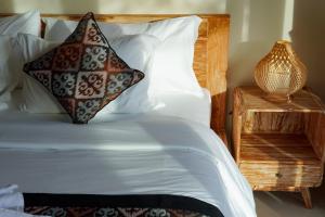 Postel nebo postele na pokoji v ubytování Uma Rimbun Pool Villa by Uniquecations