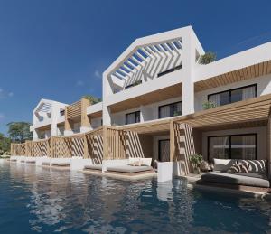 an external view of a building with a swimming pool at Sidari Waterpark in Sidari