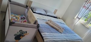Postel nebo postele na pokoji v ubytování Blue Apartment G&G