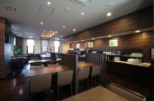 ห้องอาหารหรือที่รับประทานอาหารของ Hotel Route-Inn Marugame