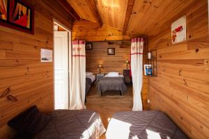 Postel nebo postele na pokoji v ubytování L'Escale Occitane