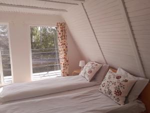 Postelja oz. postelje v sobi nastanitve Pine tree cottage