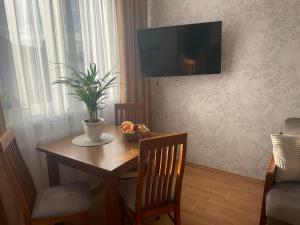 Telewizja i/lub zestaw kina domowego w obiekcie Apartamenty Vega