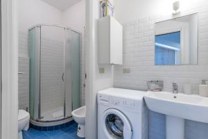 Ванна кімната в [IHost Apartment] - Adige 17