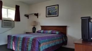 Posteľ alebo postele v izbe v ubytovaní Budget Motor Inn- Stony Point