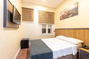 TV a/nebo společenská místnost v ubytování Valens Boutique Hotel