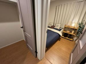 Postel nebo postele na pokoji v ubytování Sky Terrace 新築独栋戸建 阳光露台观景天空树