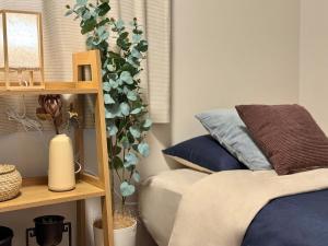 Postel nebo postele na pokoji v ubytování Sky Terrace 新築独栋戸建 阳光露台观景天空树