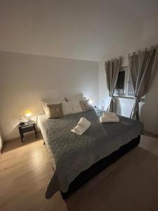 Postel nebo postele na pokoji v ubytování Apartman Leina