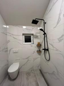Koupelna v ubytování Apartman Leina