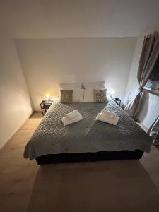 Postel nebo postele na pokoji v ubytování Apartman Leina