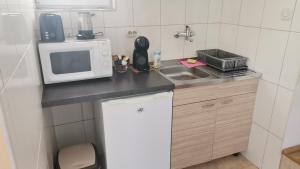 Kuchyňa alebo kuchynka v ubytovaní Apartments Krste