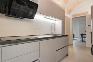 Kuchyň nebo kuchyňský kout v ubytování Chapeau Apartment - Lecce Selection