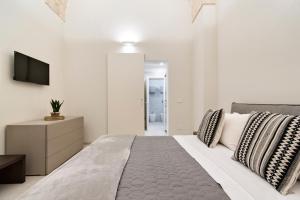 Postel nebo postele na pokoji v ubytování Chapeau Apartment - Lecce Selection
