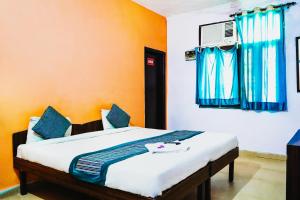 Säng eller sängar i ett rum på Hotel Near IGI Airport