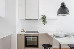 Kuchyňa alebo kuchynka v ubytovaní S35 Apartments Gdynia Orłowo