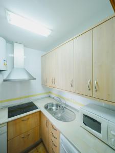 Apartamento Terraza a la Almadraba tesisinde mutfak veya mini mutfak