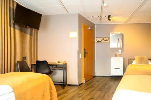 Kuchyň nebo kuchyňský kout v ubytování Akureyri Hostel