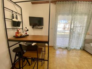 TV a/nebo společenská místnost v ubytování Terra Apartments