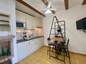 Kuchyň nebo kuchyňský kout v ubytování Terra Apartments