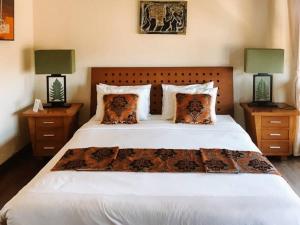 Katil atau katil-katil dalam bilik di White Coral Villa Ungasan