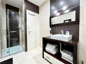 Koupelna v ubytování YBH Chalet Baiona + 27 fotografií