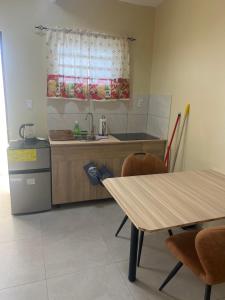 Eldhús eða eldhúskrókur á Curasita Colour Appartments & Resort - adres kaya Sucre nst 282