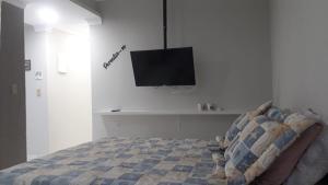 Giường trong phòng chung tại Studio Pet friendly