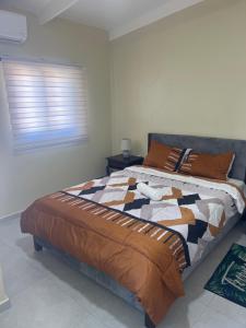 Rúm í herbergi á Curasita Colour Appartments & Resort - adres kaya Sucre nst 282