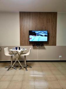 TV a/nebo společenská místnost v ubytování Cinzia's Home