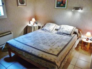 Ein Bett oder Betten in einem Zimmer der Unterkunft Villa Li Roure