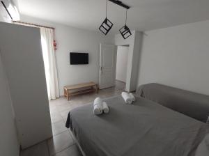 Los Deptos de Alvear客房内的一张或多张床位