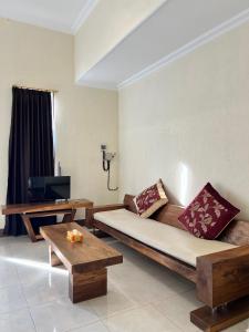 Area tempat duduk di Villa Kamboja at The Sunset Beach Resort