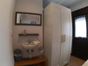 a bathroom with a sink and a mirror on the wall at Soldeu Paradis Tarter Baix in El Tarter +51 photos