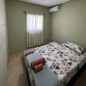 Säng eller sängar i ett rum på Costado Norte