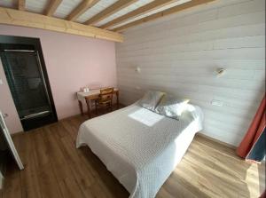 Кровать или кровати в номере Maison neuve tout confort, deux chambres