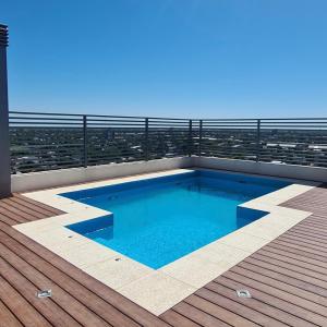 a swimming pool on the roof of a building at Costado Norte in Formosa