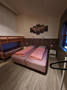 Postel nebo postele na pokoji v ubytování Eaglerock Guesthouse and tours