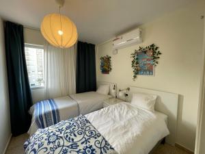 Postel nebo postele na pokoji v ubytování EPIS - large luxury apartment with sea view + 37 fotografií
