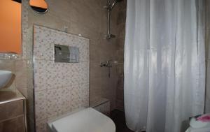 a bathroom with a shower with a toilet and a sink at Apartments Vesna Luxury ap 5 & 6 Paralia in Paralia Katerinis +75 photos