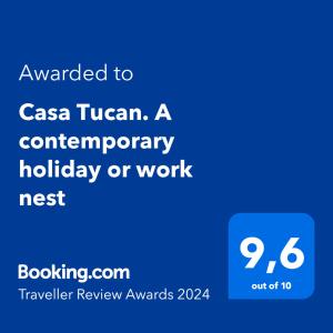 Un certificat, premiu, logo sau alt document afișat la Casa Tucan. A contemporary holiday or work nest